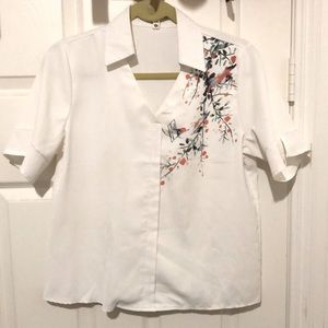 White blouse with bird print